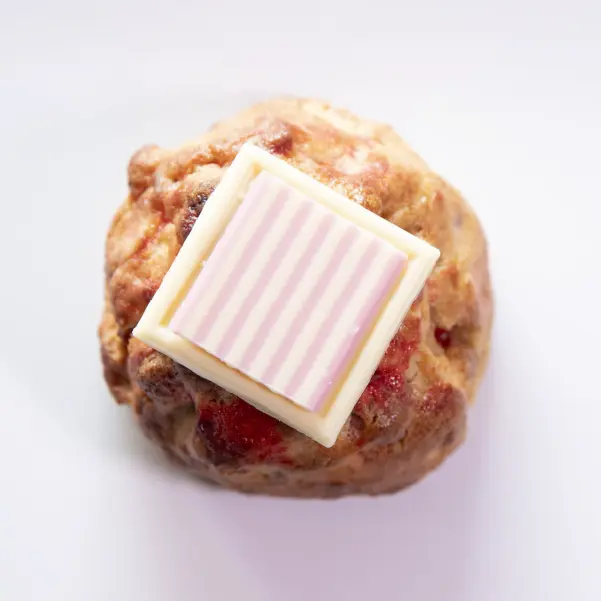Cookie Queen Strawberry Cheesecake Cookie with strawberries, cream cheese, and white chocolate